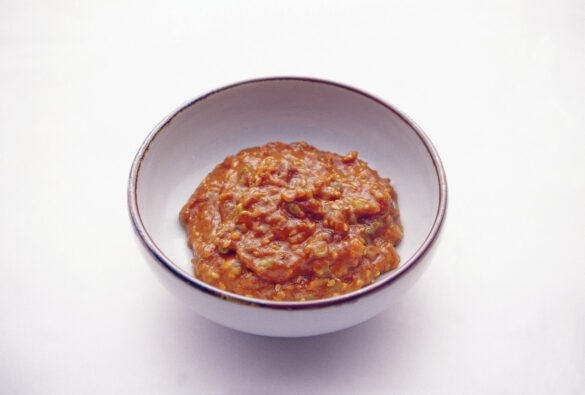 Brown Ssamjang sauce in white bowl